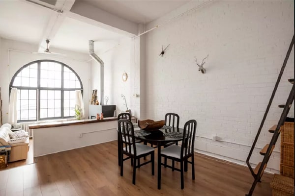 Photo of Large Loft High Ceilings White Walls Arched Window Furniture Free
