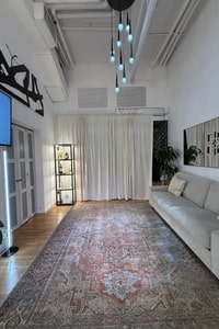 listings.show.sections.photos.alt