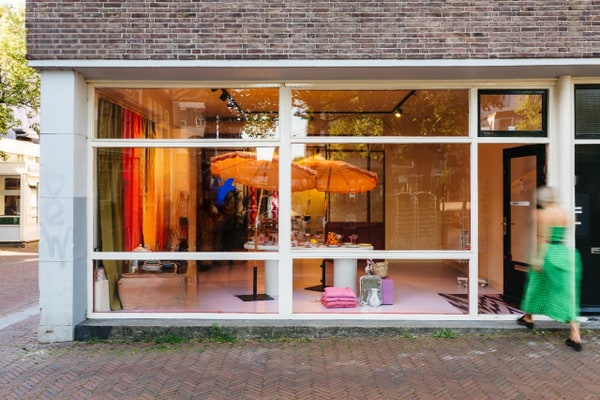 Street-Level Pop-Up Store with Large Windows in Central Amsterdam