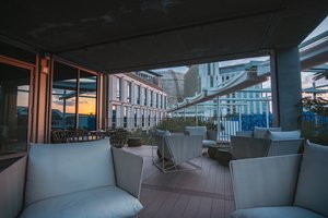 listings.show.sections.photos.alt