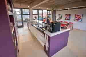 listings.show.sections.photos.alt