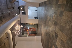 listings.show.sections.photos.alt