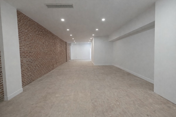 Bright Street-Level Studio with 14ft Ceilings and Full Glass Front — Photo, Video, Content | Downtown Manhattan