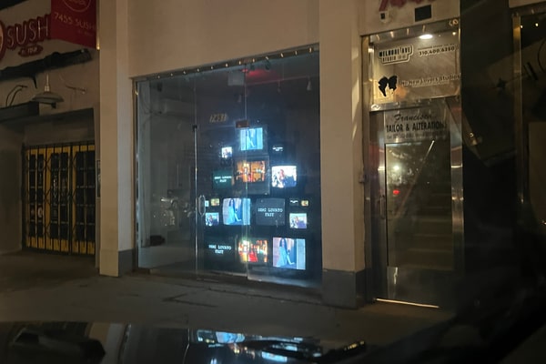 Photo of Prime Melrose Storefront location plus detached VIP room busy intersection