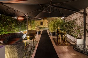 listings.show.sections.photos.alt