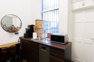 listings.show.sections.photos.alt