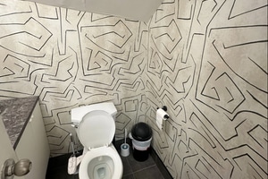 listings.show.sections.photos.alt