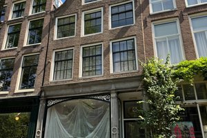 listings.show.sections.photos.alt